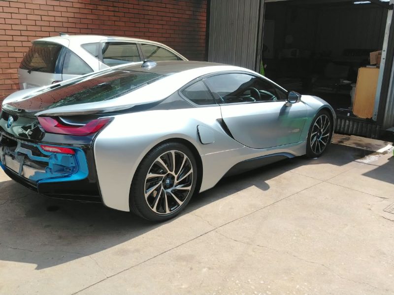 A silver BMW i8 in the yard at Q&A Auto Repairs