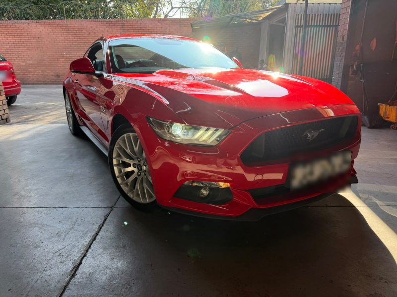 A red Ford Mustang GT at Q&A Auto Repairs