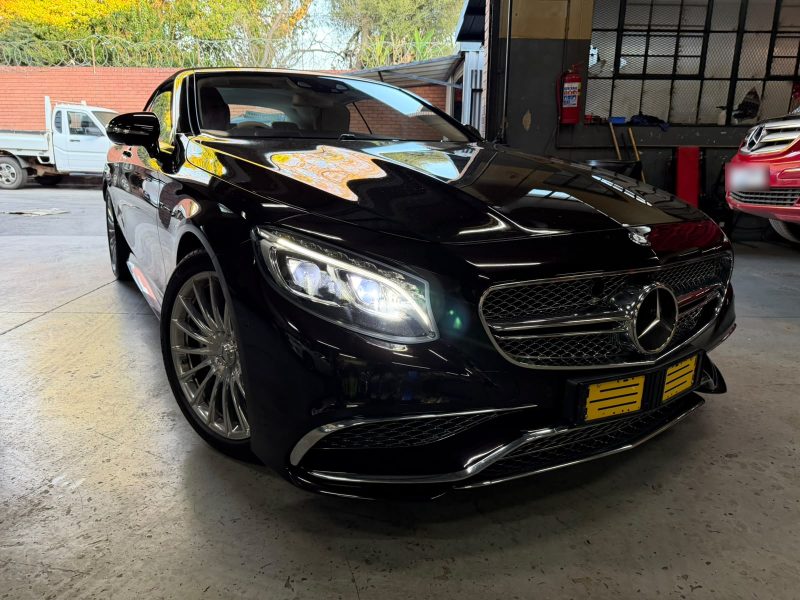A black Mercedes-AMG S65 cabriolet in the Q&A Auto Repairs workshop
