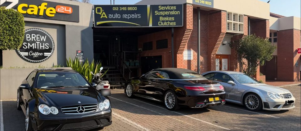The Q&A Auto Repairs shopfront on Selati Street, Ashlea Gardens, with three Mercedes-Benz cars parked outside